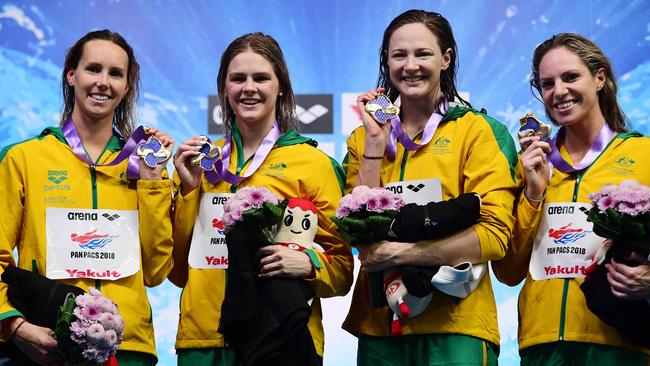 August 2018: Gold medallists (from left) Emma McKeon, Shayna Jack, Cate Campbell and Emily Seebohm pose on the podium of the 400m freestyle relay women final of the Pan Pacific Swimming Championships in Tokyo. Picture: Martin Bureau/AFP