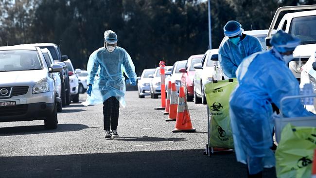 Cars line for Covid testing in Campbelltown as a result of high cases in the area. Picture: Jeremy Piper