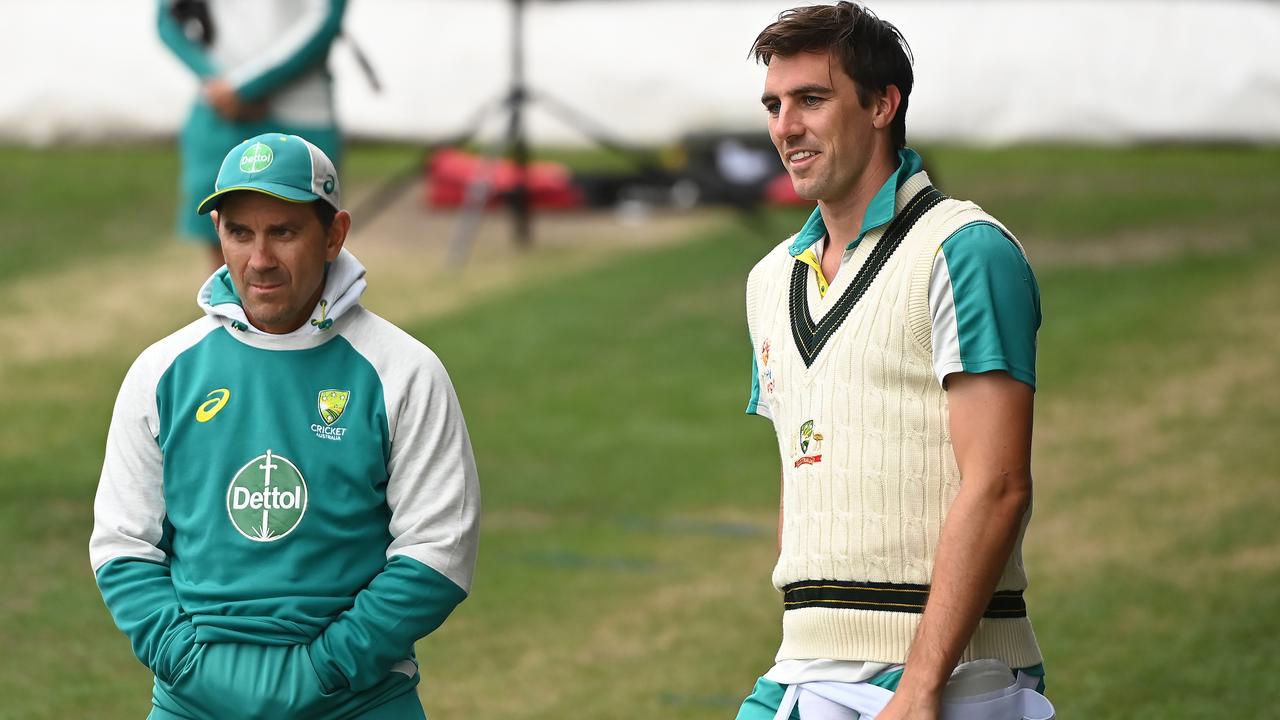 Pat Cummins Captain of Australia chats with Justin Langer Head Coach of Australia during an Australian Ashes squad nets session at Blundstone Arena on January 12, 2022 in Hobart, Australia. (Photo by Steve Bell/Getty Images)