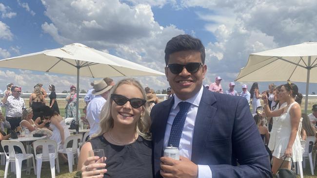 Punters dressed in their finest black and white for Derby Day celebrations in Dubbo. Photo: Tijana Birdjan