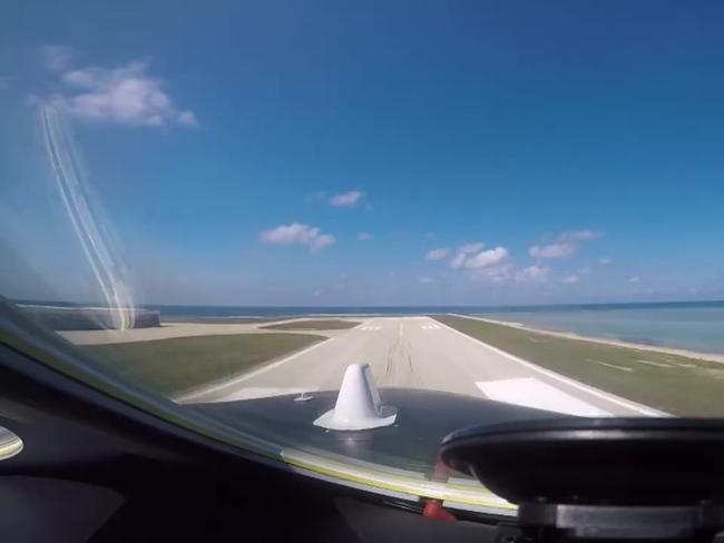 A view from the cockpit of a Chinese H-6K bomber conducting 'touch-and-go' landing operations at Woody Island. Picture: People's Daily