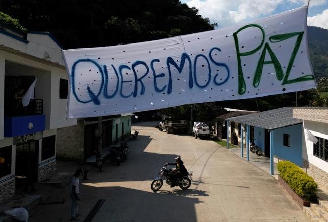 A banner reading 'We Want Peace' hangs on a street in Teorama municipality in Colombia's Catatumbo region, where the country's worst security crisis in a decade is raging a series of guerrilla attacks