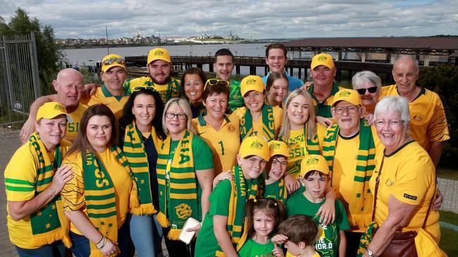Socceroos goal keeper Mat Ryan has 26 of his family and relatives having traveled from Sydney to be in Kazan for the Socceroos first World Cup game against France. Mum Carol (centre with yellow sunglasses on head) and sister Megan (centre wearing yellow cap) pictured with the extended family in Kazan. Picture; Toby Zerna