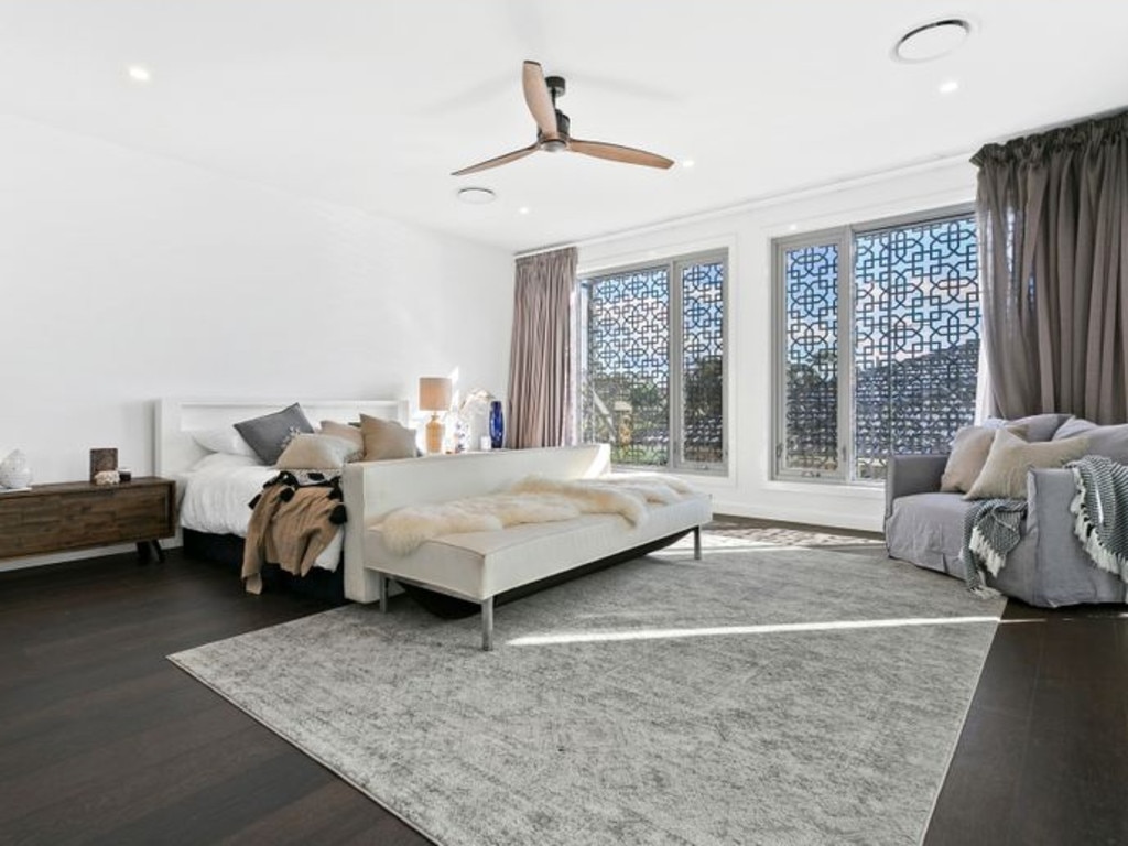 There are five bedrooms, with the master designed to be like a hotel suite. Picture: realestate.com.au