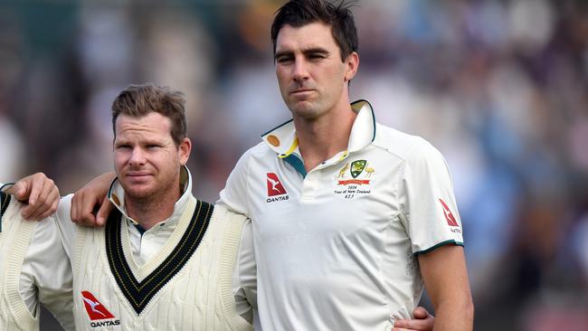 Smith and his captain Pat Cummins line up for Australia’s national anthem in Christchurch. Picture: Getty Images