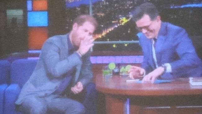 Prince Harry and Stephen Colbert down shots on The Late Show. Picture: T. Jackson/Backgrid