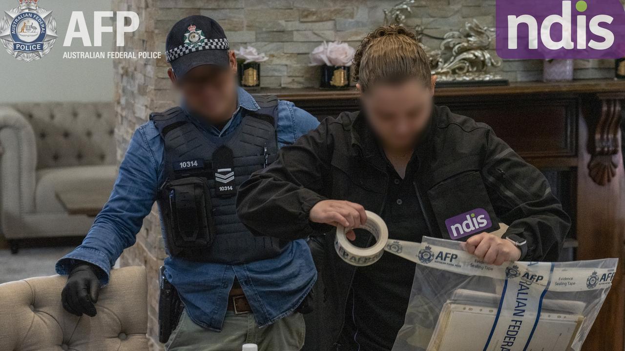 The NDIS Fraud Fusion Taskforce raiding a property in western Sydney in 2022 over a Middle Eastern organised crime posing as disability support providers. Picture: AFP