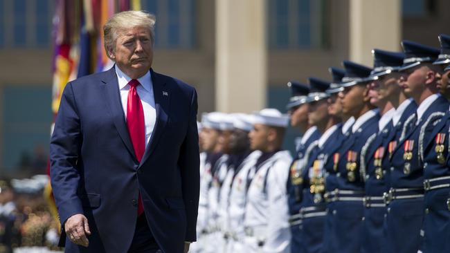 President Donald Trump reviews the troops at the Pentagon in Washington.