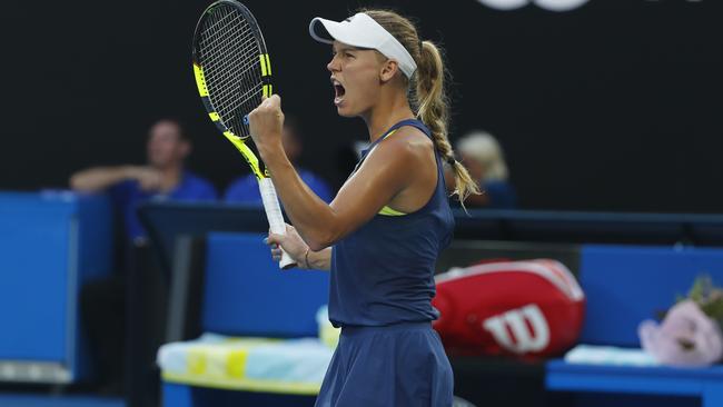 Caroline Wozniacki defeated Simona Halep in three sets to claim her maiden grand slam title. Picture: Michael Klein