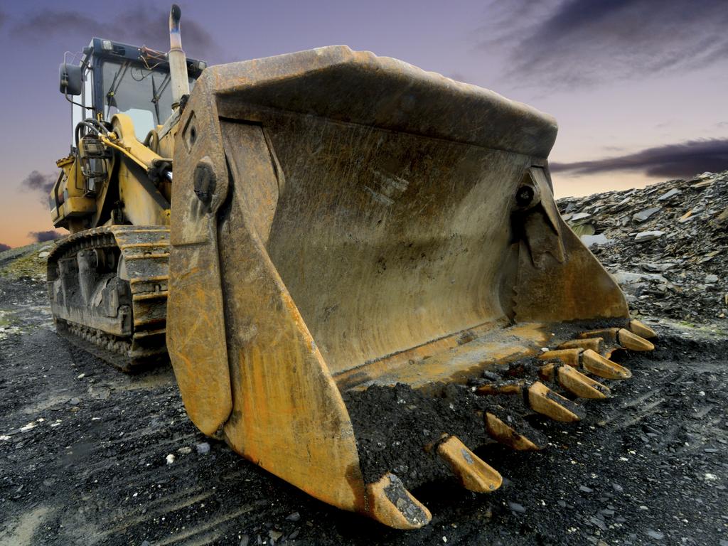 Image of a Quarry Shovel at sunset.