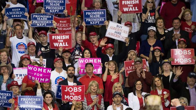 Supporters cheer Donald Trump at a rally in Houston.