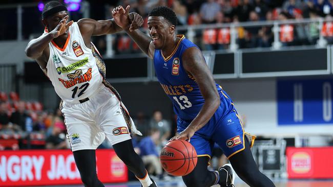 The battle between the Brisbane Bullets and Cairns Taipans is always a hotly contested one. Picture: Jono Searle/Getty Images