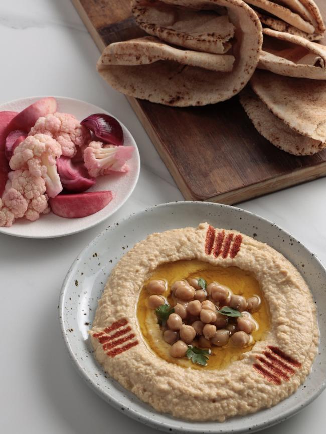 Hummus and pickles by Rose Adam. Photo: Duy Huynh