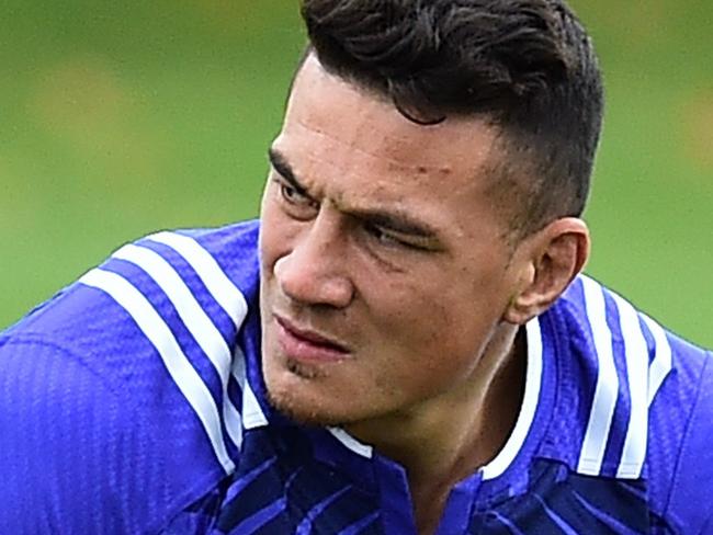 New Zealand All Blacks' centre Sonny Bill Williams stretches during a training session at the Lensbury Hotel in Teddington, south-west London, on September 16, 2015, ahead of the 2015 Rugby Union World Cup, which begins on September 18. AFP PHOTO / GABRIEL BOUYS