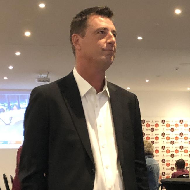 The independent candidate for Wakehurst Michael Regan watches intently at the Manly Warringah Football Club at Cromer on Saturday evening as the first votes start to roll in. Picture Jim O'Rourke