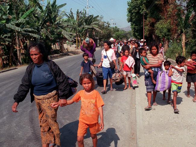 SEPTEMBER, 1999 : East Timorese head for United Nations compound in Dili, seeking safety as pro Jakarta militia roamed the streets in the wake of the independence referendum. Picture: Kellie Block