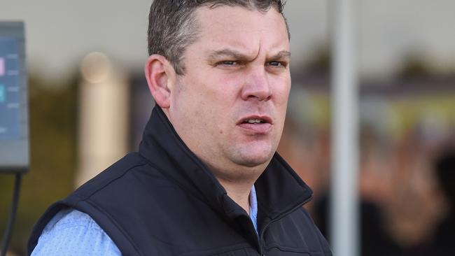 Trainer Trent Busuttin (pictured) and training partner Natalie Young will give Mostly Cloudy a crack at earning a Melbourne Cup start in Saturday’s $500,000 Andrew Ramsden at Flemington. Picture: Racing Photos via Getty Images.