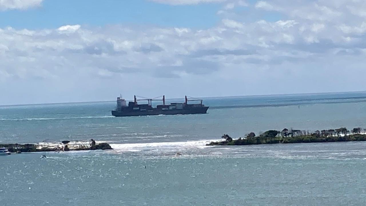 A king tide and huge swells combined to break through part of Bribie Island, creating a second bar into the Pumicestone Passage.