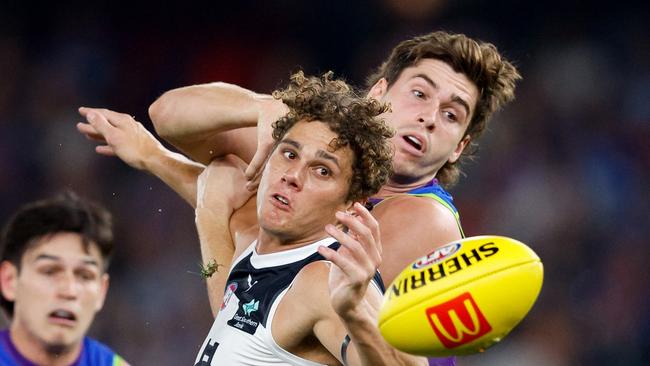 Carlton star limps off late in Blues’ big win