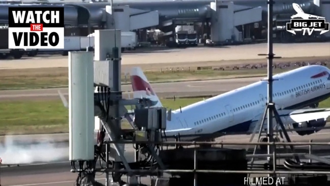 Terrifying moment plane bounces down runway in massive winds