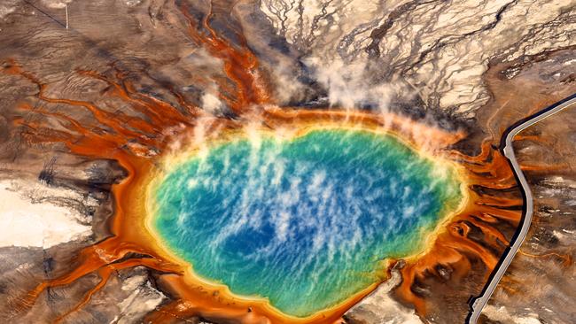 Image Name: Grand Prismatic Spring, Yellowstone Photographer Name: Jassen Todorov, 2nd place Image Description: I flew across the country to capture this spectacular natural wonder. At sunrise and 11,000 feet, I overcame high winds and turbulence while trying to maintain altitude and capture the right angle without people on the walkway. This place is not only remote but flying over mountains and high terrain is dangerous. While circling, I felt I didn't want to leave. There are just not enough words to describe magic. Picture: Jassen Todorov, 2nd place, USA National Award, 2015 Sony World Photography Awards