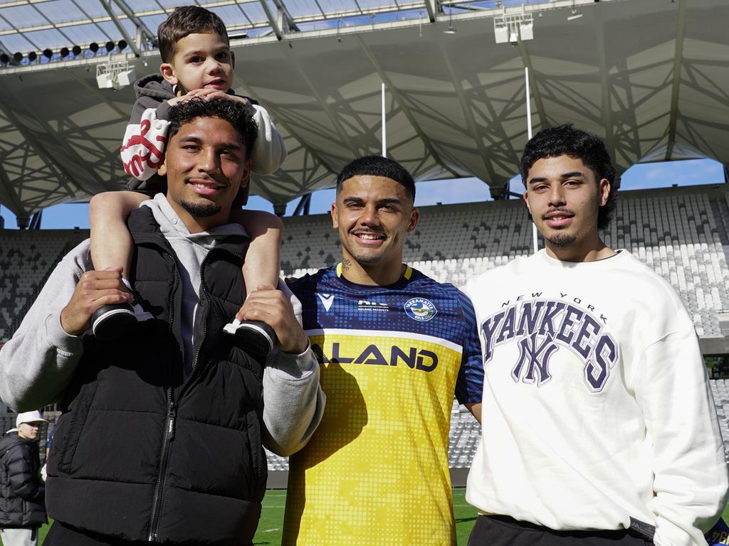 Izack Tago (in black vest), Issiah Tago (Jake's son, on Izack's shoulders), Jake Tago and Levi Tago (Jake's brother)