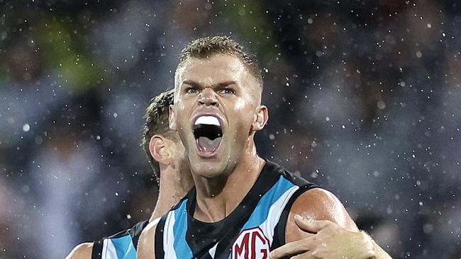 Port Adelaide's Dan Houston celebrates kicking a goal  during the AFL Gather Round match between Port Adelaide and the Western Bulldogs at the Adelaide Oval on April 15, 2023.  Photo by Phil Hillyard(Image Supplied for Editorial Use only - **NO ON SALES** - Â©Phil Hillyard )