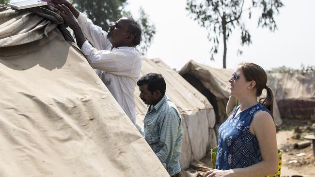 Emma Colenbrander, pictured installing a solar light in India.