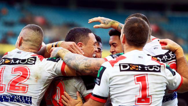 Tyson Frizell of the Dragons celebrates a try with teammates. pic Mark Evans