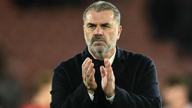 Tottenham Hotspur's Greek-Australian Head Coach Ange Postecoglou applauds the fans following the English Premier League football match between Southampton and Tottenham Hotspur at St Mary's Stadium in Southampton, southern England on December 15, 2024. (Photo by JUSTIN TALLIS / AFP) / RESTRICTED TO EDITORIAL USE. No use with unauthorized audio, video, data, fixture lists, club/league logos or 'live' services. Online in-match use limited to 120 images. An additional 40 images may be used in extra time. No video emulation. Social media in-match use limited to 120 images. An additional 40 images may be used in extra time. No use in betting publications, games or single club/league/player publications. /