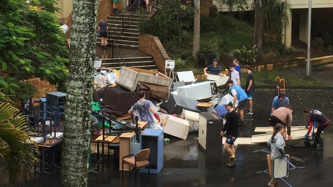 Flood clean up effort Trinity Catholic College, Lismore.