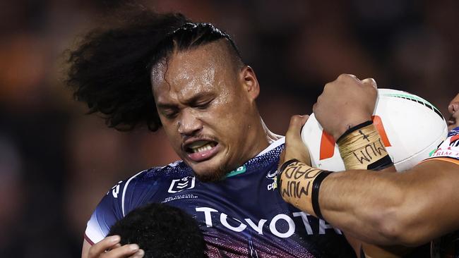 SYDNEY, AUSTRALIA - MAY 20:  Luciano Leilua of the Cowboys is tackled during the round 12 NRL match between Wests Tigers and North Queensland Cowboys at Leichhardt Oval on May 20, 2023 in Sydney, Australia. (Photo by Matt King/Getty Images)