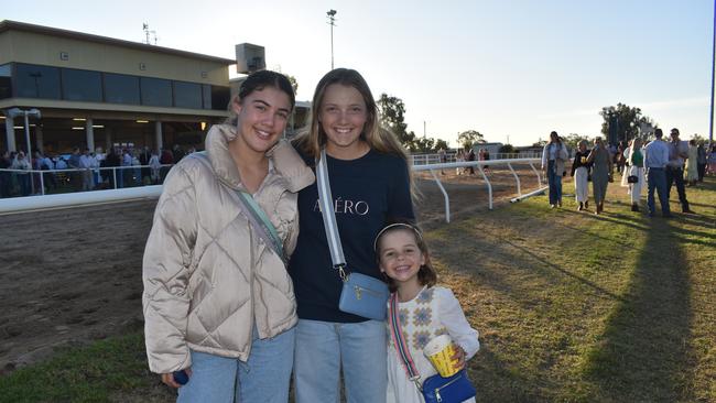 Izzy, Maggie and Elle at the Roma Rugby Races at Bassett Park on Saturday June 24, 2023. Picture: Chloe Cufflin.