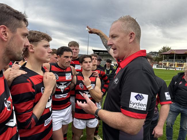 Lauderdale coach Brent Dolliver addresses the Bombers at quarter-time. Picture: James Bresnehan