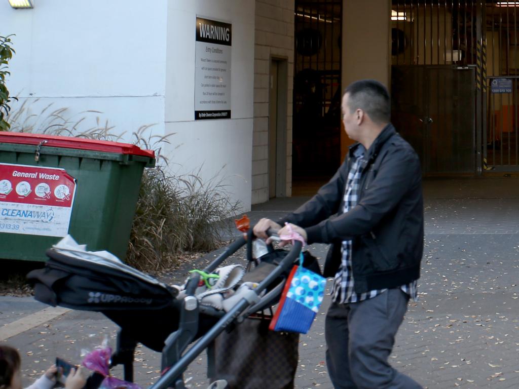 Another resident leaves the building. Picture: Damian Shaw