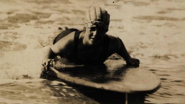 Isabel Letham rode tandem on Duke Kahanamoku’s surfboard. Picture: Northern Beaches Library Local Studies