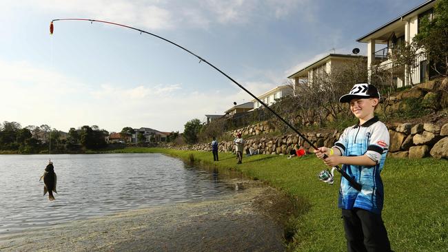 Kayos Hapeta-Williams, 7, from SEQ Carp and Tilly Busters, a group set up to cull pest fish species. Picture Glenn Hampson.