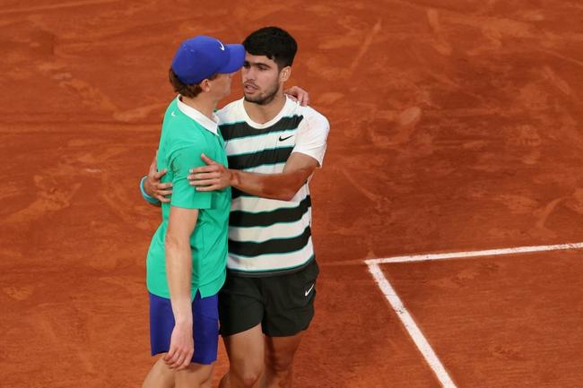 Carlos Alcaraz consoles Jannik Sinner after the Italian suffered a heartbreaking loss in the French Open final