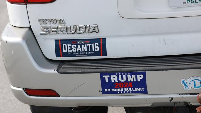 A Florida Gov. Ron DeSantis sticker and one reading, 'Trump 2024 No More Bullshit', are plastered on a vehicle near the Mar-a-Lago home of the former president Donald Trump.