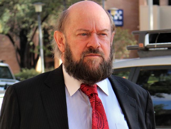 NT Police barrister Ian Freckelton KC arrives at the Alice Springs Local Court for the inquest into the death of Kumanjayi Walker in September 2022.