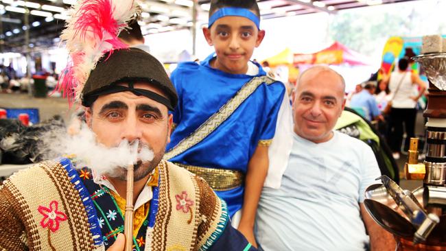 Ramy Yokhana with a Smoke Hookah with Antonie Yokhana and his father George Yokhana. (AAP Image / Angelo Velardo)