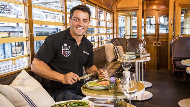 Cooper Cronk has been hired to talk up his experiences since moving to Sydney.