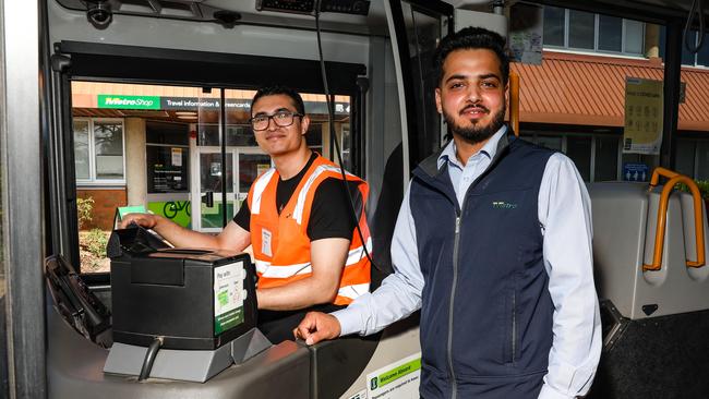 Trainee bus operator Suraj Shrestha and driver educator, Krishan Kant at Metro in Moonah Picture: Linda Higginson