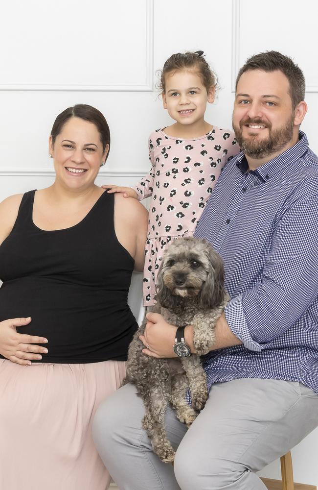 Julia Colbron, Mat Colbron, daughter Mila and dog Alfie. Julia and Mat started the popular website Tell Me Baby, which reviews Australian baby products. Picture: Supplied