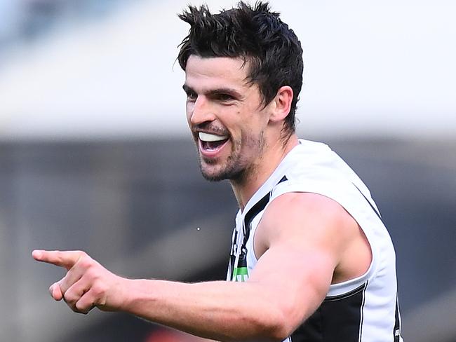 MELBOURNE, AUSTRALIA - AUGUST 10: Scott Pendlebury of the Magpies celebrates kicking a goal during the round 21 AFL match between the Melbourne Demons and the Collingwood Magpies at Melbourne Cricket Ground on August 10, 2019 in Melbourne, Australia. (Photo by Quinn Rooney/Getty Images)