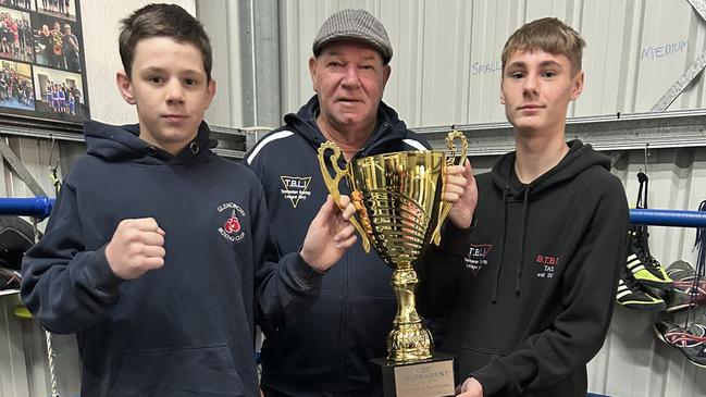 Teenage boxers Tyler Wordsworth and Jett Ford with Rod Curtain. Picture Supplied