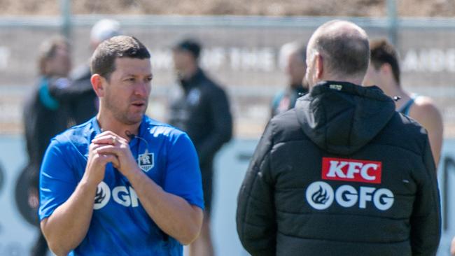 Josh Carr and Ken Hinkley during a Port Adelaide training session. Picture: NCA NewsWire / Naomi Jellicoe