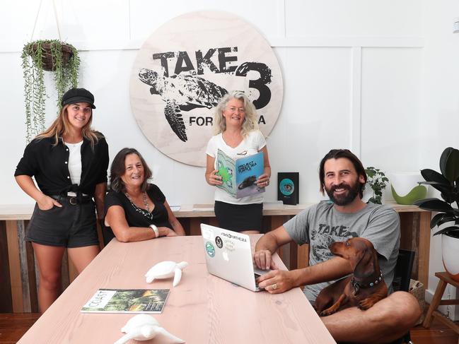 The Take 3 For the Sea team at their new office: (l-r) Madeleine Bell, Giselle Coates, Roberta Dixon-Valk and Tim Silverwood with Frankie the dog, Picture: Sue Graham