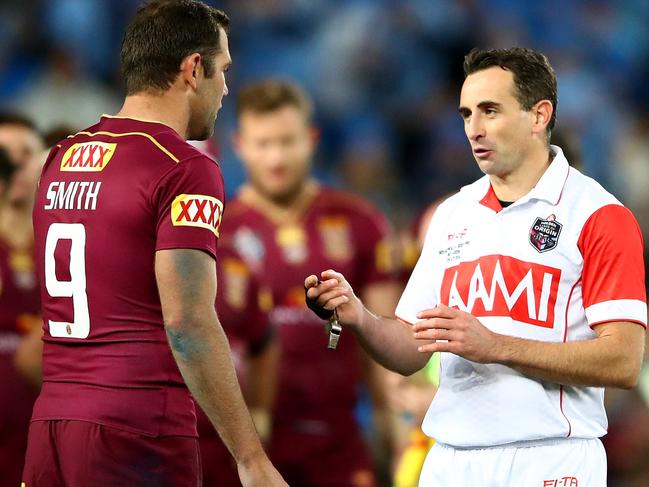 SYDNEY, AUSTRALIA - JULY 13:  Cameron Smith of the Maroons talks to match referee Gerard Sutton during game three of the State Of Origin series between the New South Wales Blues and the Queensland Maroons at ANZ Stadium on July 13, 2016 in Sydney, Australia.  (Photo by Cameron Spencer/Getty Images)