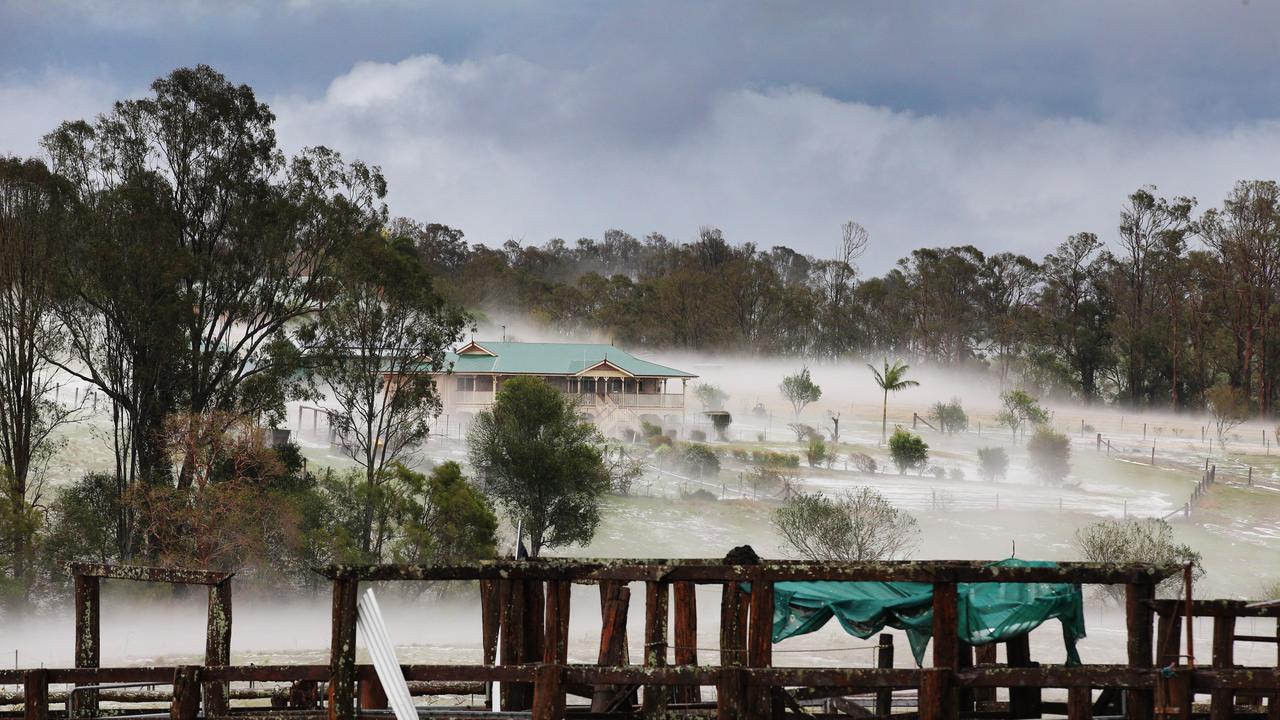 Properties at Long Flat south of Gympie resemble snowfields after a super cell dumped hail, tore down trees and caused devastation across the Burnett and South East. Photo Lachie Millard